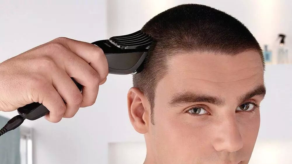 corte de cabelo masculino com maquina na lateral